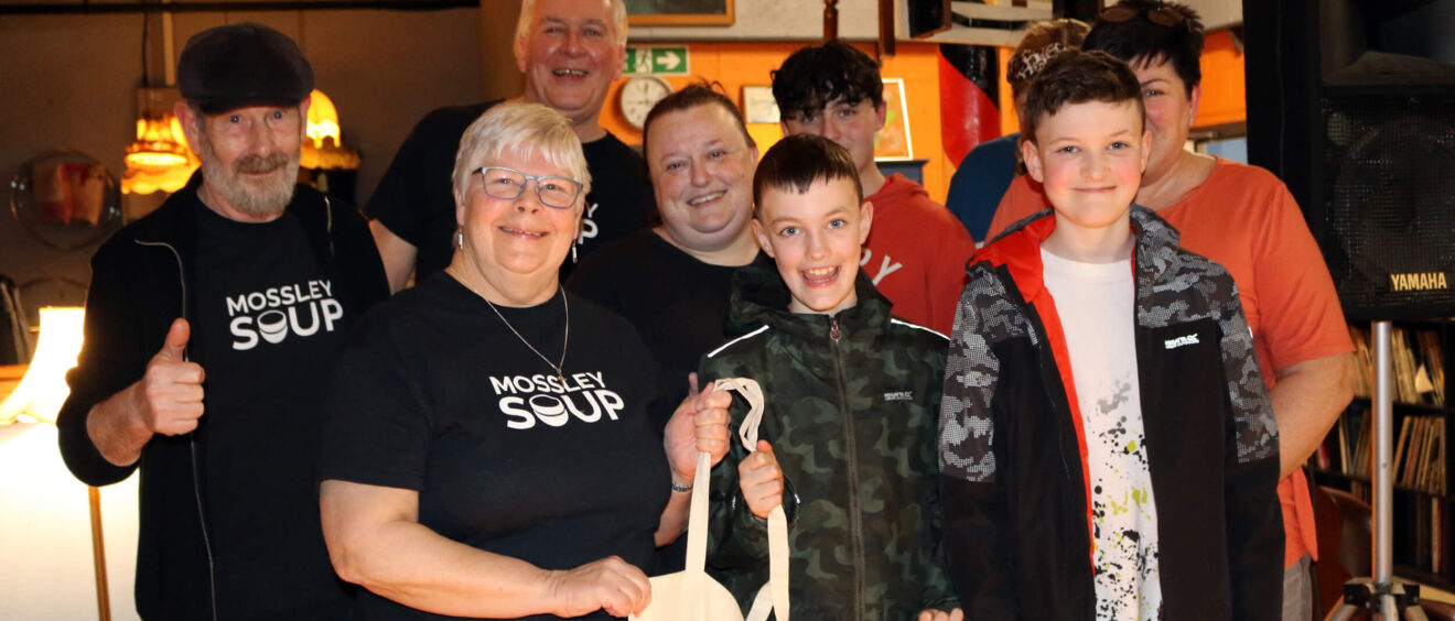 Mossley SOUP volunteers with members of S.P.E.L.L